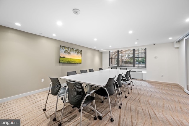 view of carpeted dining area