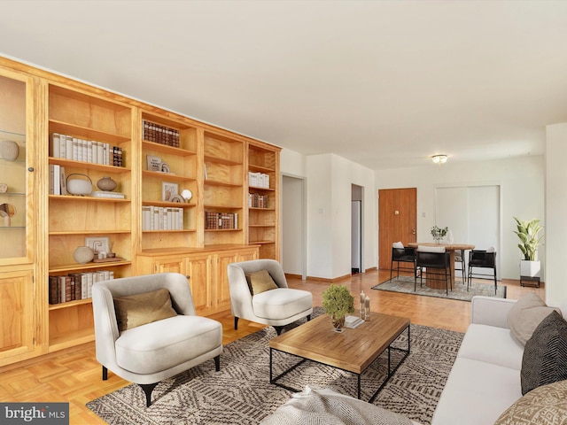 living room featuring light parquet flooring