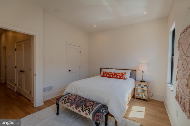 bedroom featuring light wood-type flooring