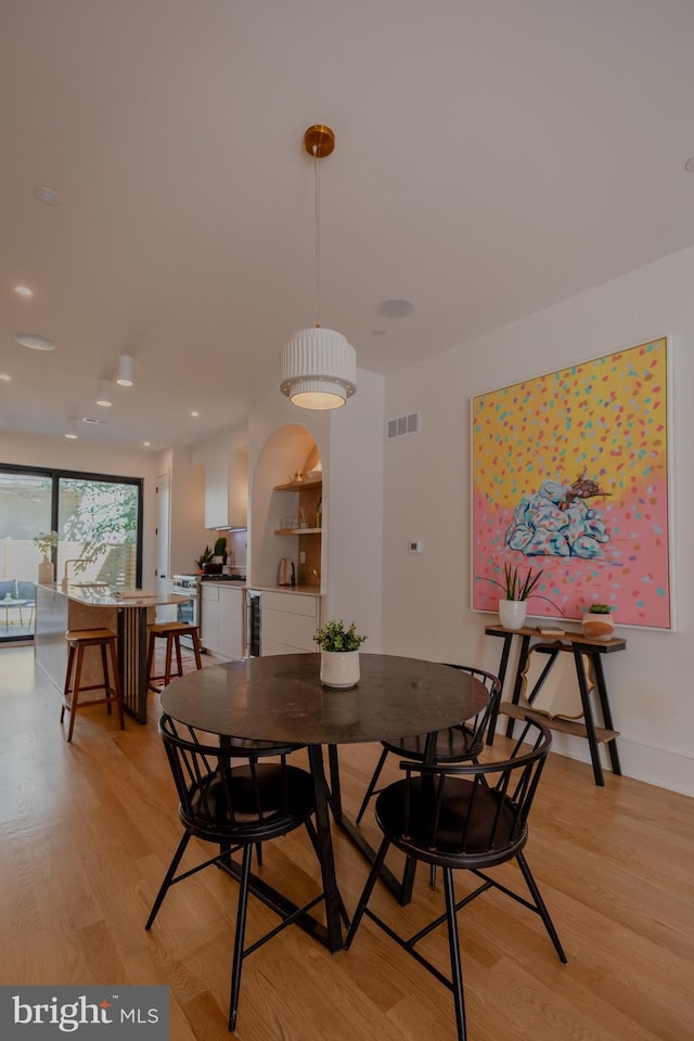 dining room featuring light hardwood / wood-style flooring