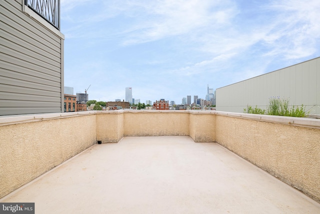 view of patio with a balcony