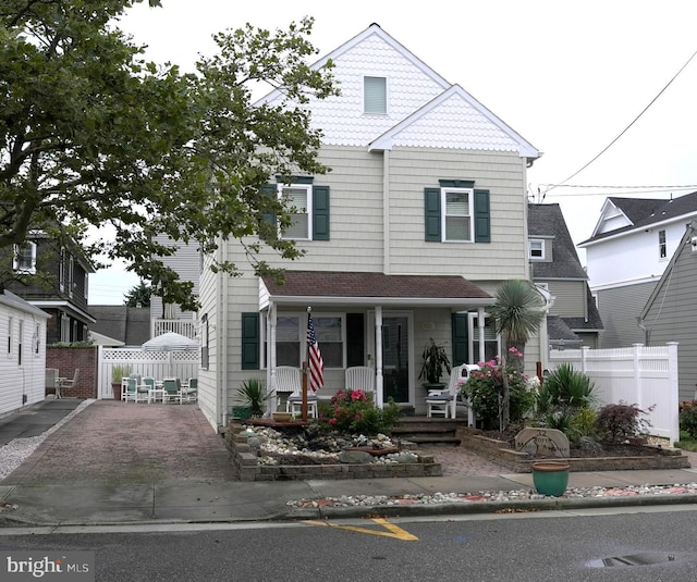 view of front of home featuring covered porch