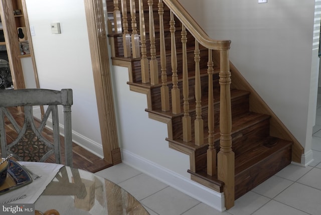 stairway with tile floors