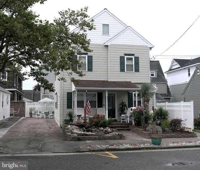 view of front of home featuring covered porch