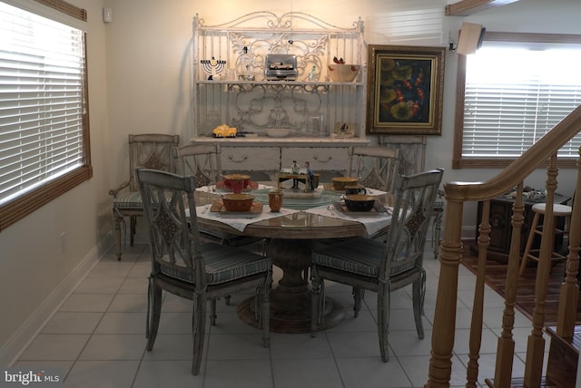 dining area featuring tile flooring