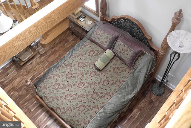 bedroom featuring hardwood / wood-style flooring