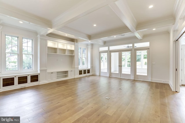 unfurnished living room featuring beamed ceiling, coffered ceiling, and light hardwood / wood-style flooring