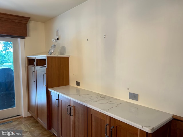 kitchen with light stone counters