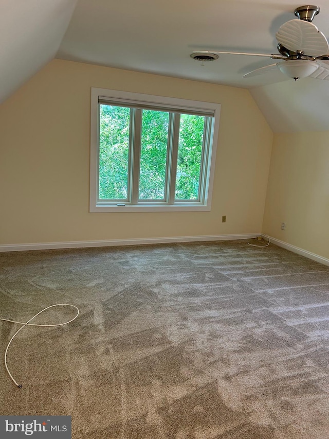 bonus room featuring carpet flooring, ceiling fan, and lofted ceiling