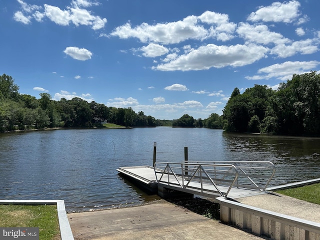 view of dock with a water view