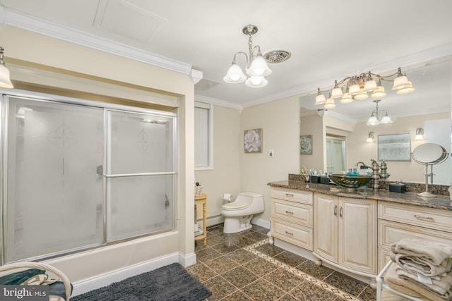 full bathroom with combined bath / shower with glass door, ornamental molding, vanity, an inviting chandelier, and toilet