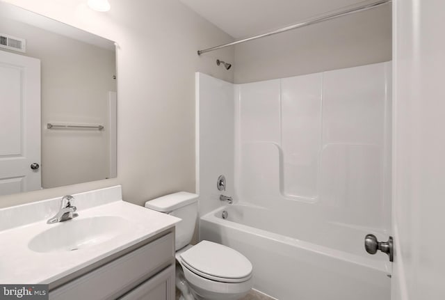 full bathroom featuring bathtub / shower combination, vanity, and toilet