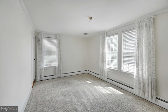 empty room featuring light colored carpet and crown molding