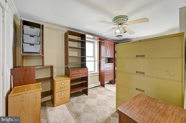 unfurnished office featuring a baseboard heating unit, light carpet, ornamental molding, and ceiling fan