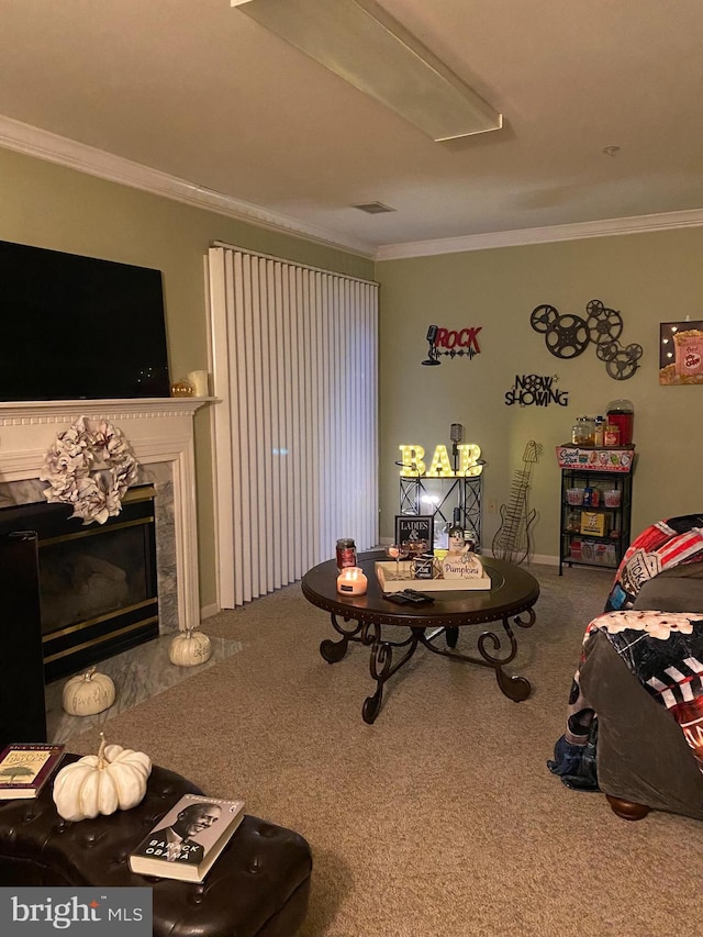 living room with carpet floors, a fireplace, and crown molding