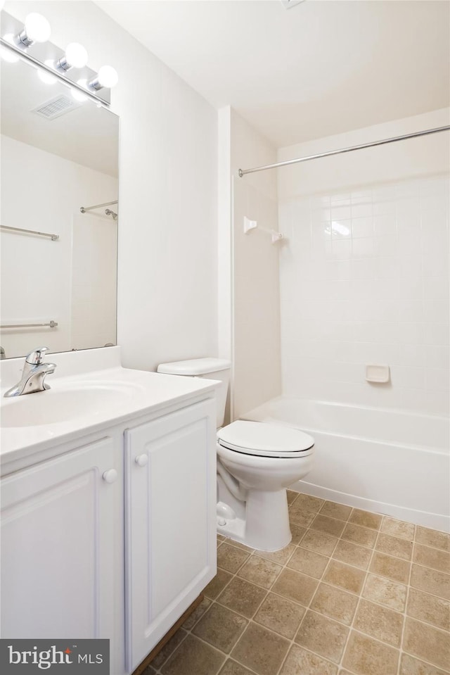 full bathroom with vanity, shower / bathtub combination, and toilet