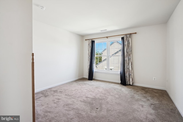 view of carpeted spare room