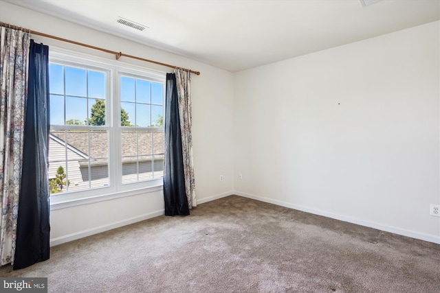 view of carpeted spare room