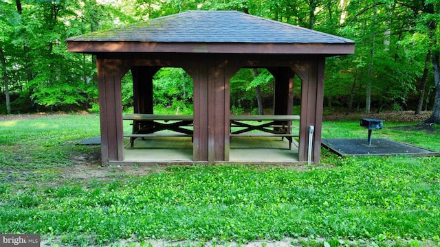 view of community with a gazebo and a lawn