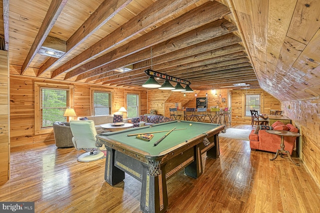 game room with wooden walls, hardwood / wood-style floors, wood ceiling, and pool table