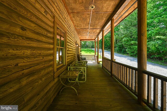 deck with covered porch