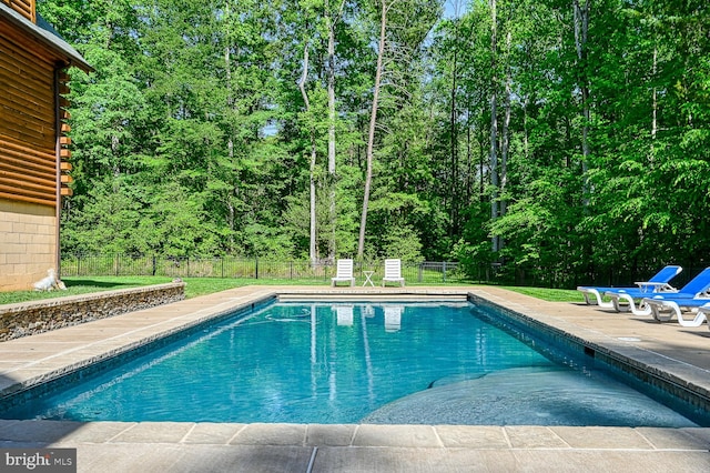 view of pool featuring a patio area