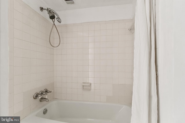 bathroom featuring shower / tub combo