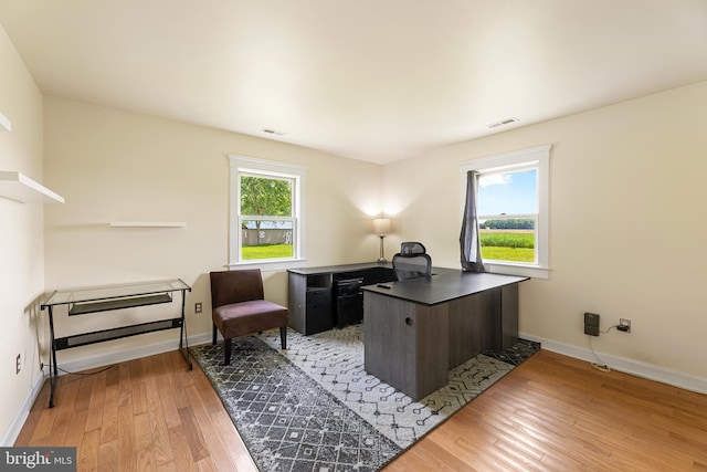 office space featuring light hardwood / wood-style floors