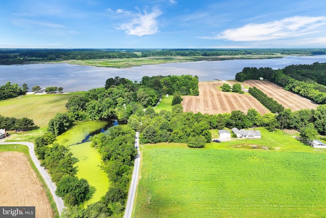 drone / aerial view with a rural view and a water view