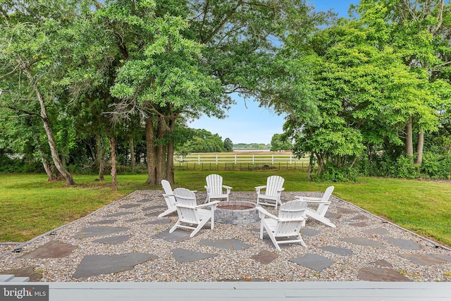 view of patio featuring an outdoor fire pit