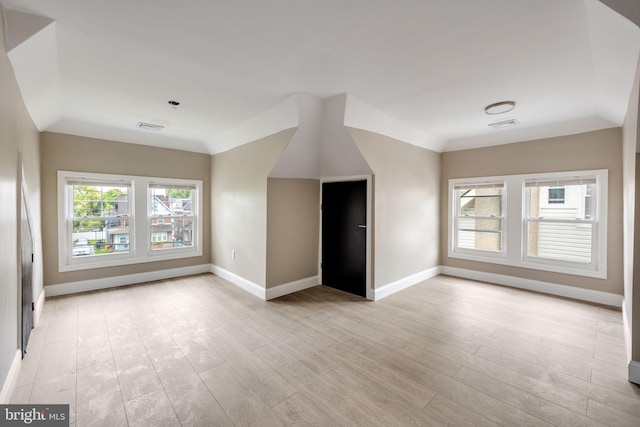 unfurnished living room featuring light hardwood / wood-style flooring