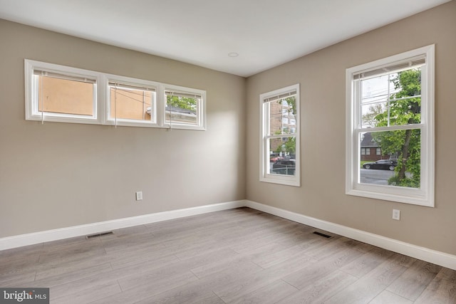 empty room featuring light hardwood / wood-style floors