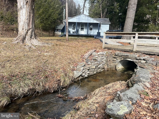 view of yard with a water view