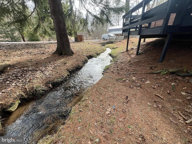 view of yard featuring a water view