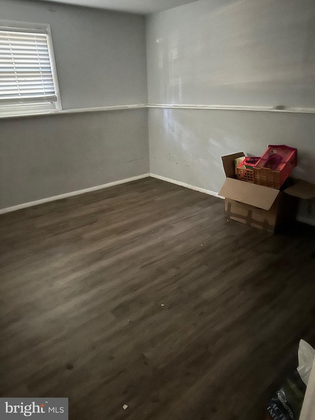 interior space with dark hardwood / wood-style flooring