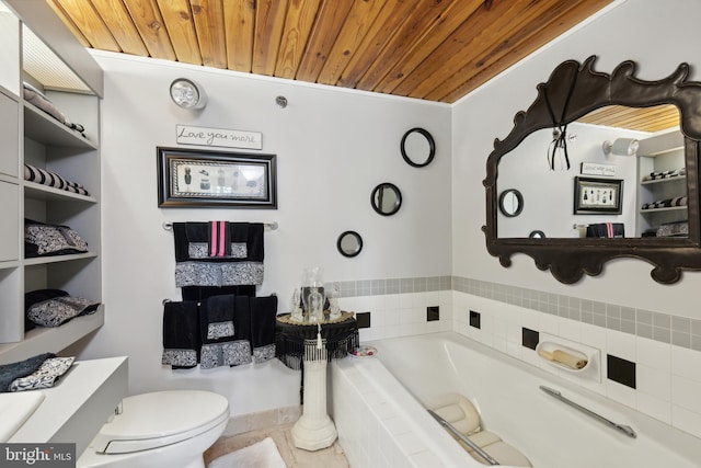 bathroom with crown molding, tile floors, tiled bath, toilet, and wooden ceiling