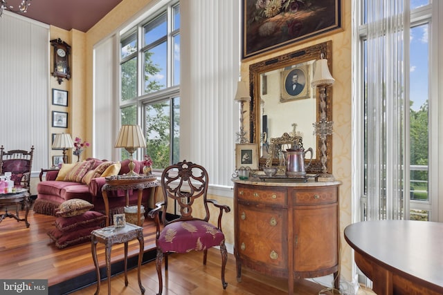 sitting room with hardwood / wood-style flooring