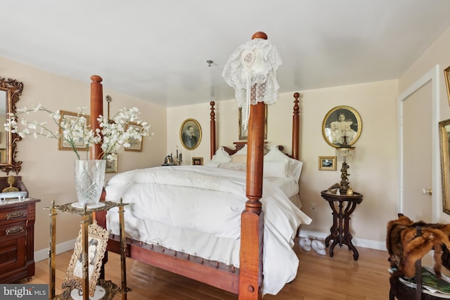 bedroom featuring hardwood / wood-style flooring