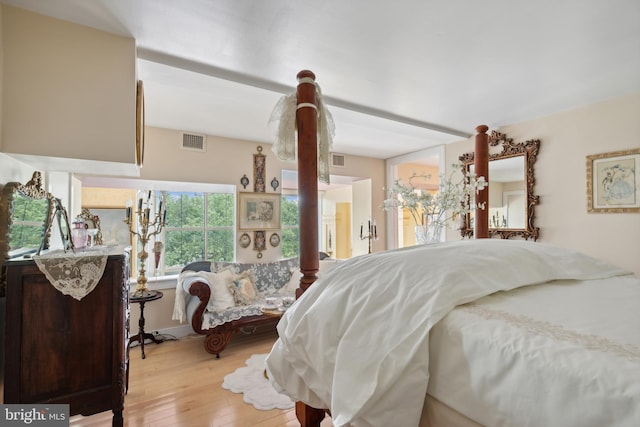 bedroom with light wood-type flooring