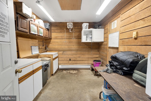 interior space featuring wooden walls and white cabinets