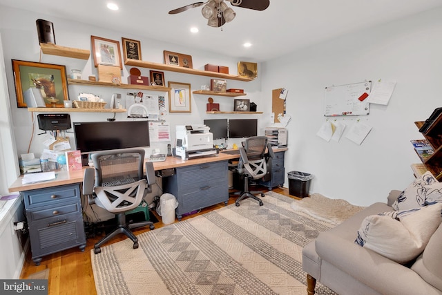 home office featuring ceiling fan and light wood-type flooring