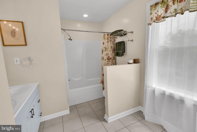 bathroom with tile patterned floors, vanity, and shower / bath combination with curtain