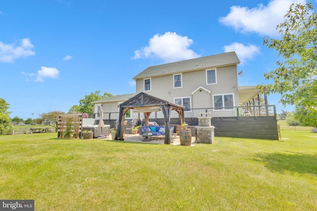 back of house featuring a gazebo, an outdoor hangout area, a yard, and a patio