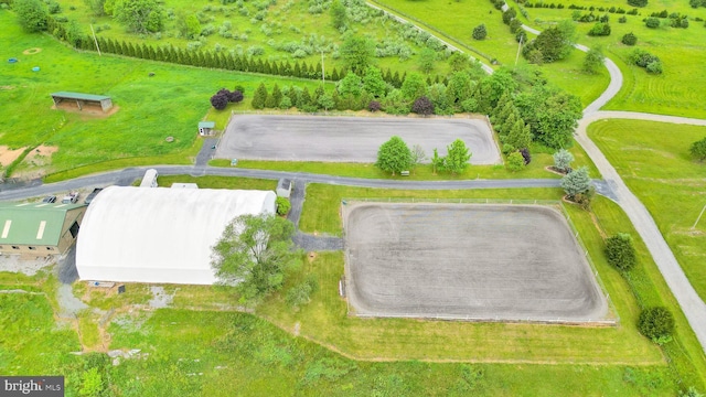 birds eye view of property featuring a rural view