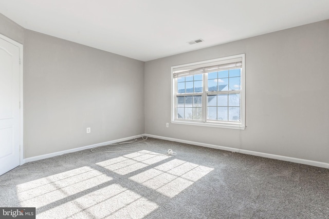 view of carpeted spare room