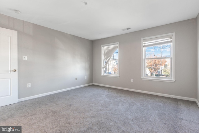 view of carpeted spare room