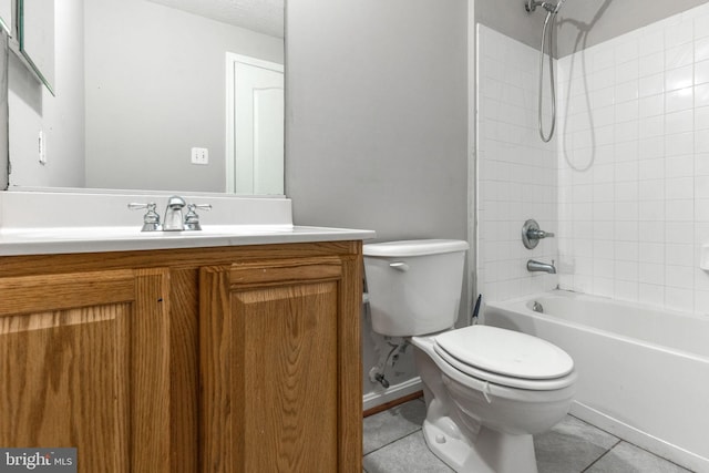 full bathroom featuring toilet, a textured ceiling, vanity, shower / washtub combination, and tile patterned flooring