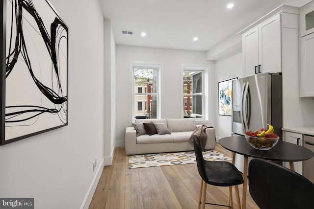 living room featuring light wood-type flooring