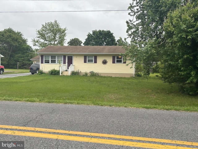 view of front of property with a front yard