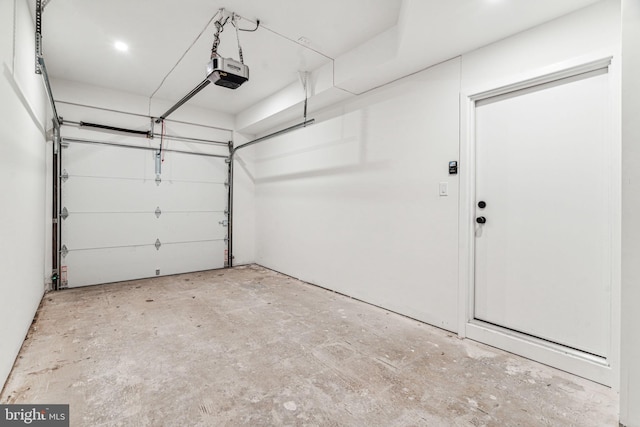 garage featuring a garage door opener